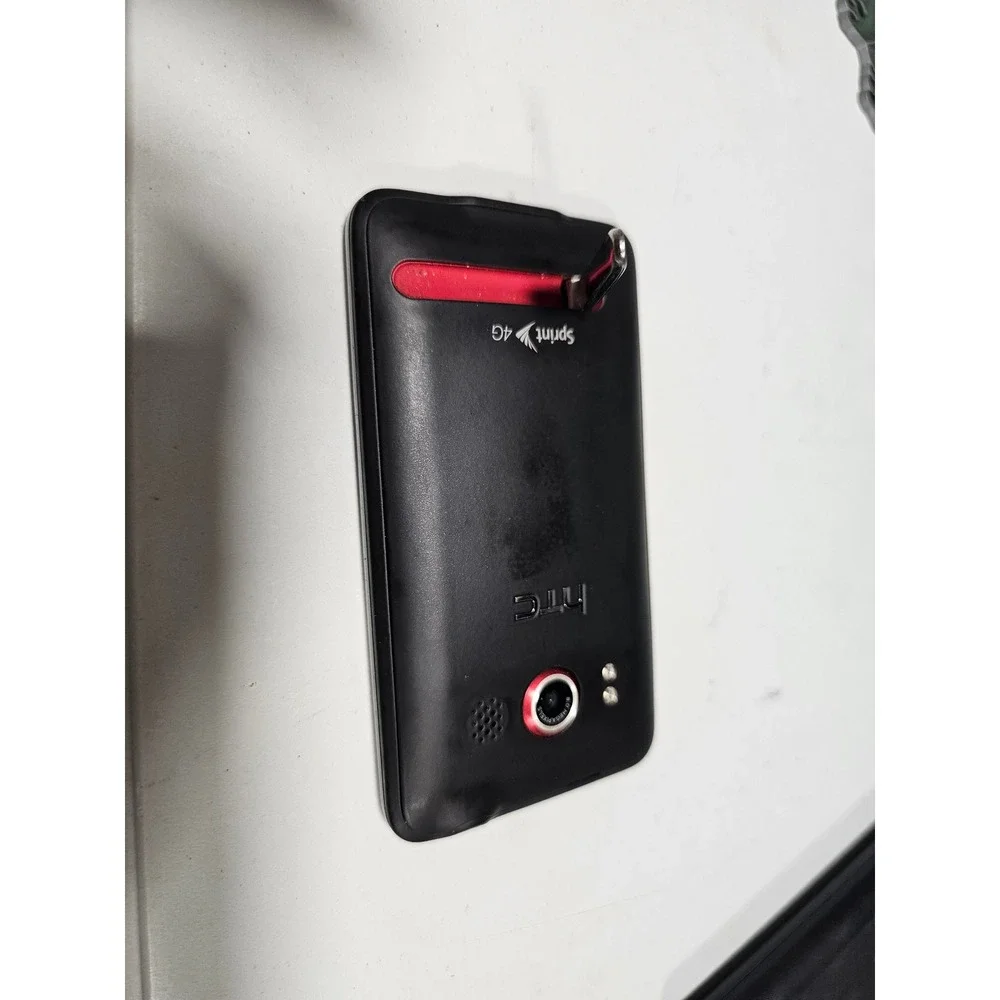 vintage HTC Evo 4G smartphone for the Sprint network stand y2k